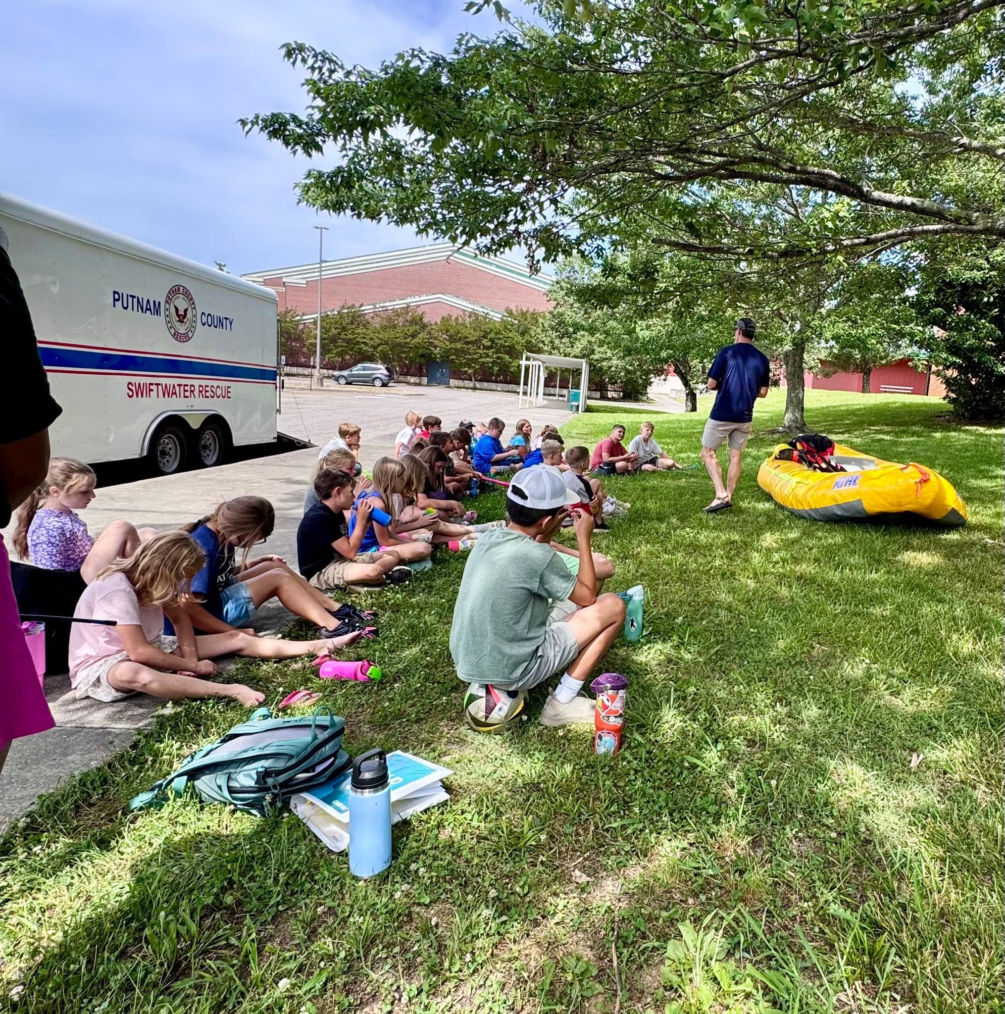 Certified Swift Water Technician - Jon Dukes speaking to campers about water safety